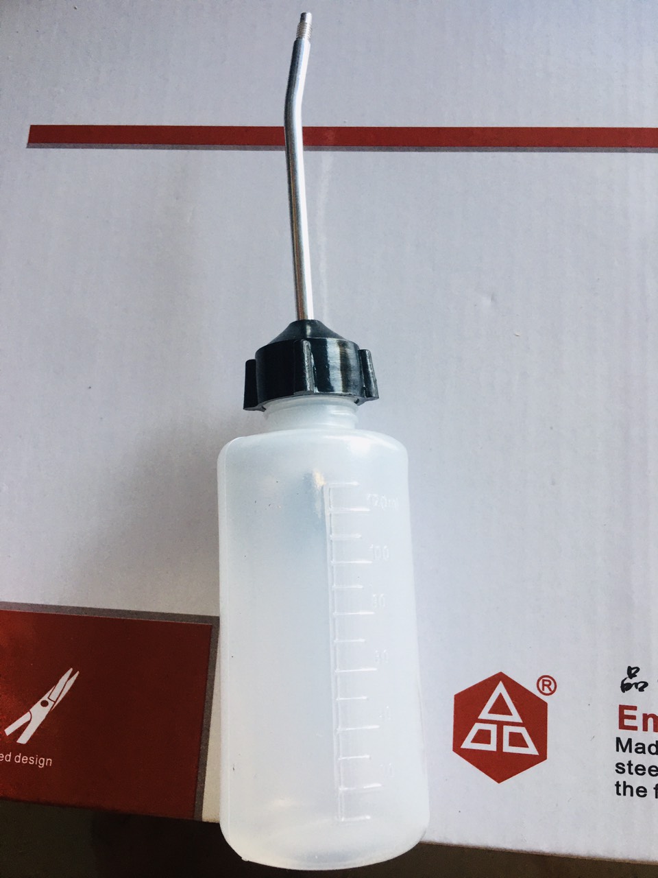 binh tra châm nhớt đầu kim loại