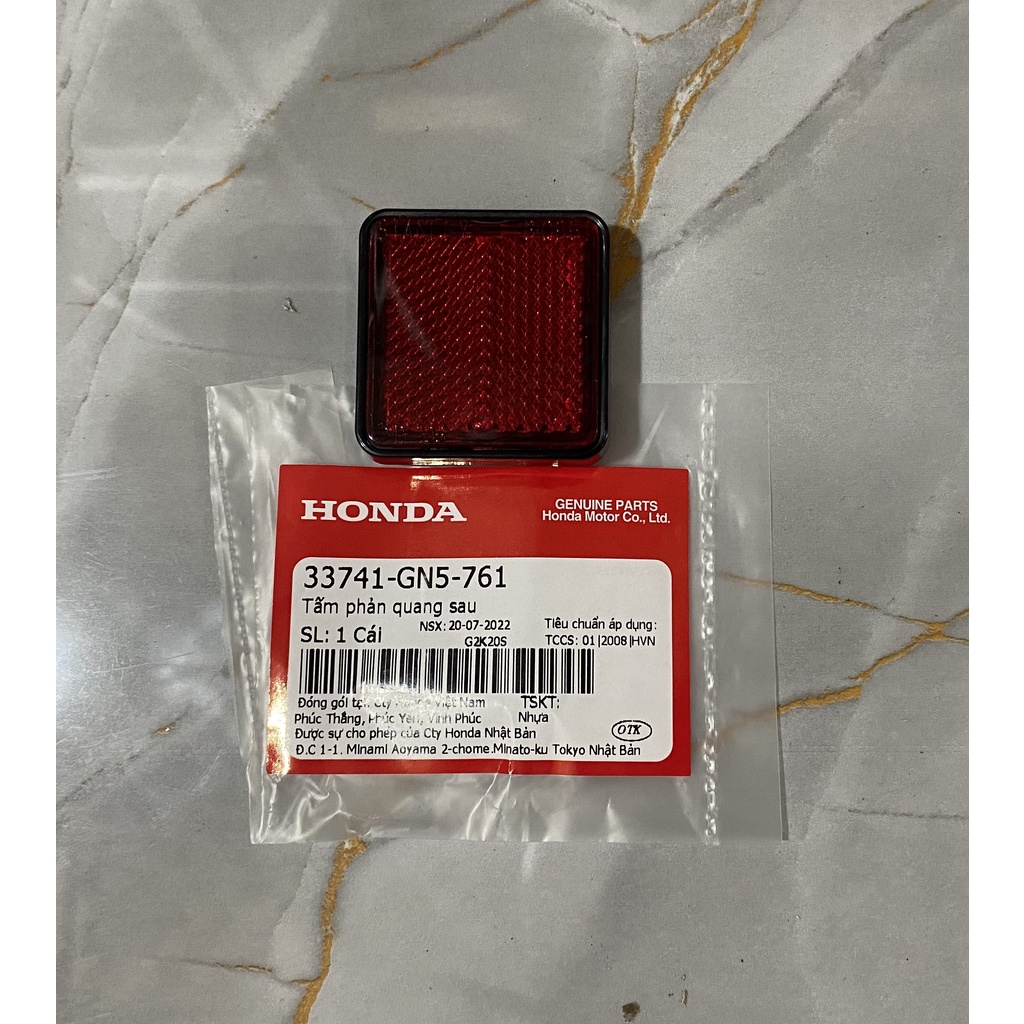 33741gn5761 tấm phản quang sau dream honda.