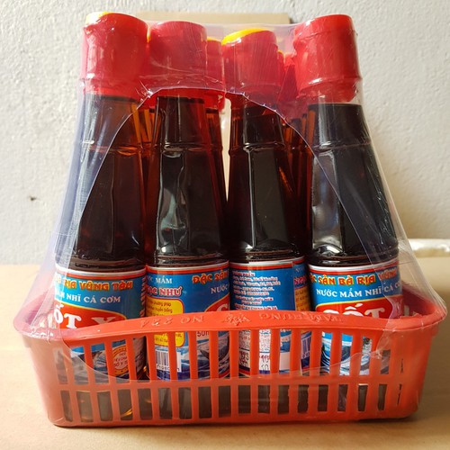 Chai nước mắm nhỉ cá cơm truyền thống sạch ATVSTP . Nước mắm cốt y