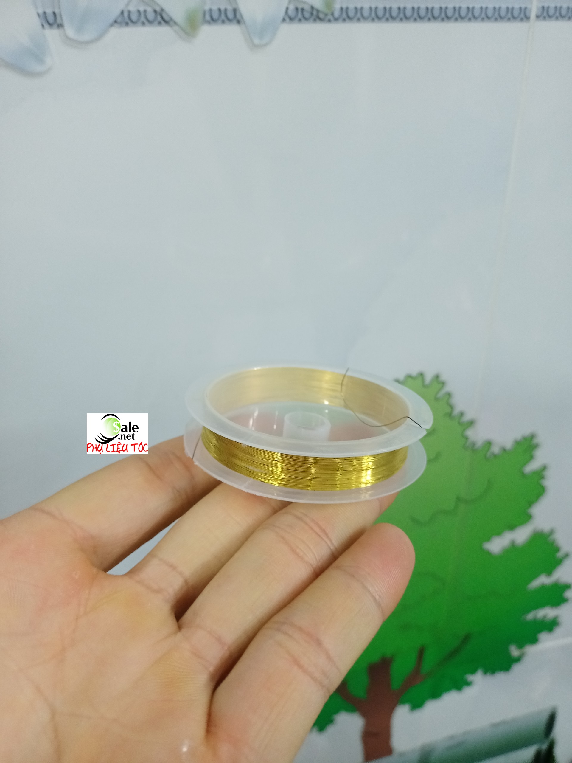 Khoanh chỉ dây thép vàng đùng để trang trí móng
