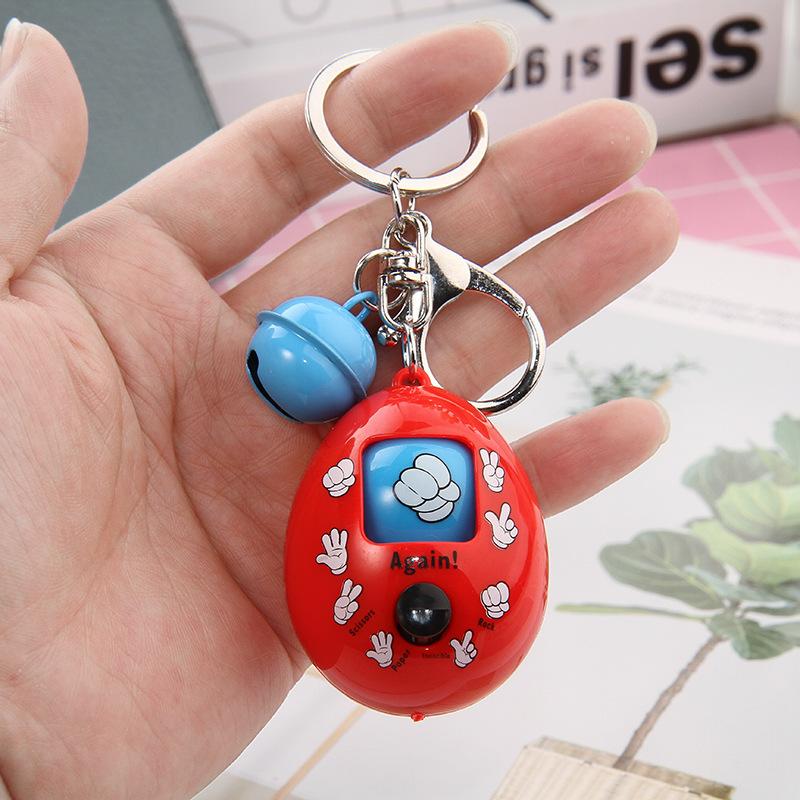 Móc khóa quả trứng oẳn tù tì đỏ chuông mini xanh