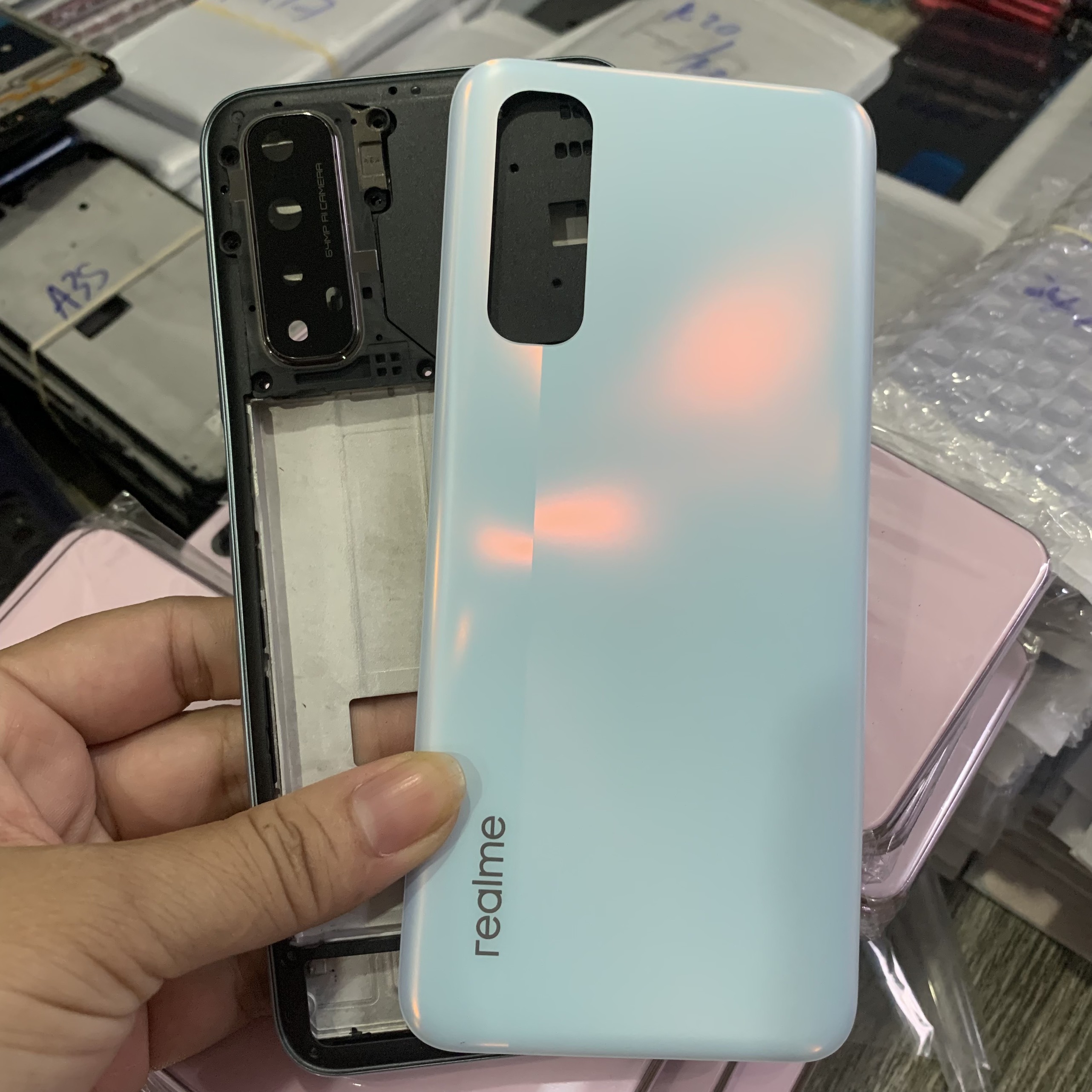 Bộ vỏ realme 7 zin có kính cam