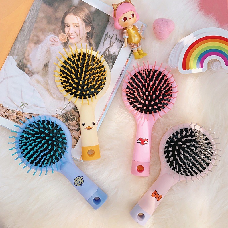 Lược cầm tay kèm gương 2in1