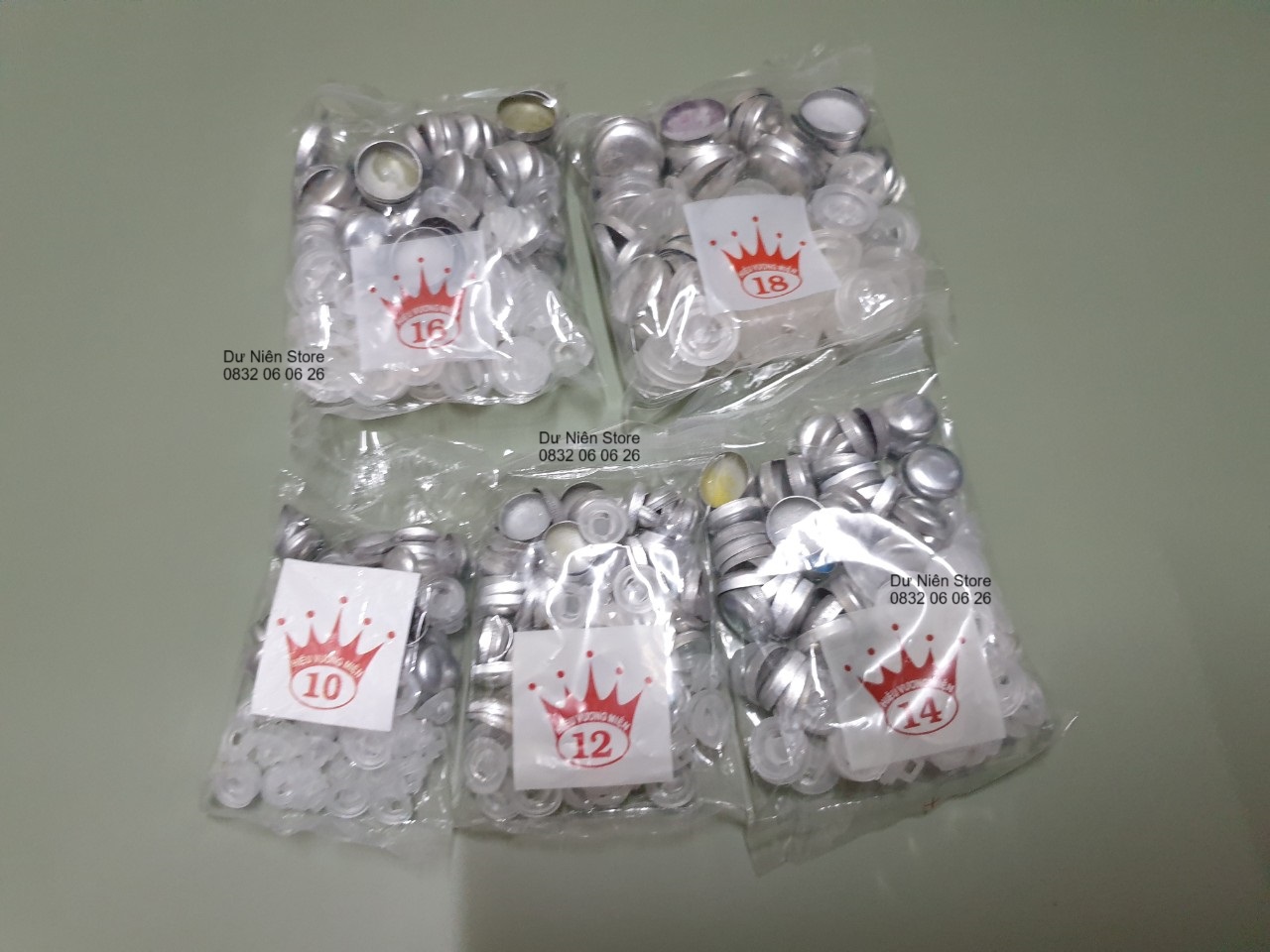 Nút bọc vải đủ size chân nhựa gói 50 nút.