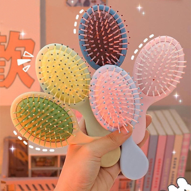 Lược gỡ rối chải tóc massage da đầu mini giúp tóc bồng bềnh suôn mượt