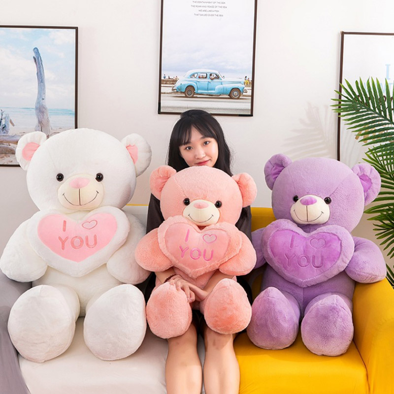 Gấu bông teddy ôm tim siêu dễ thương, chất liệu bông cao cấp mềm mại