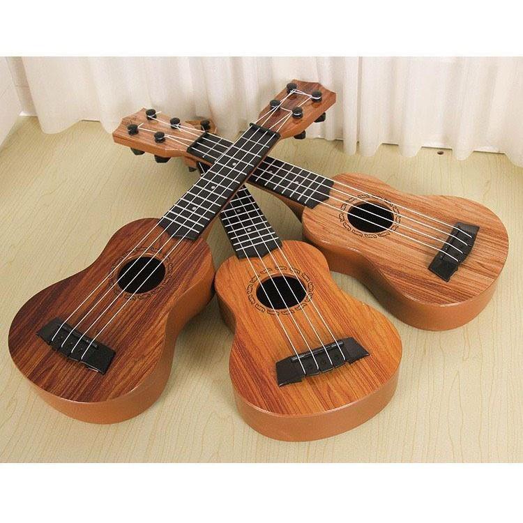 Đồ chơi đàn guitar mini giả gỗ cho bé tập đánh