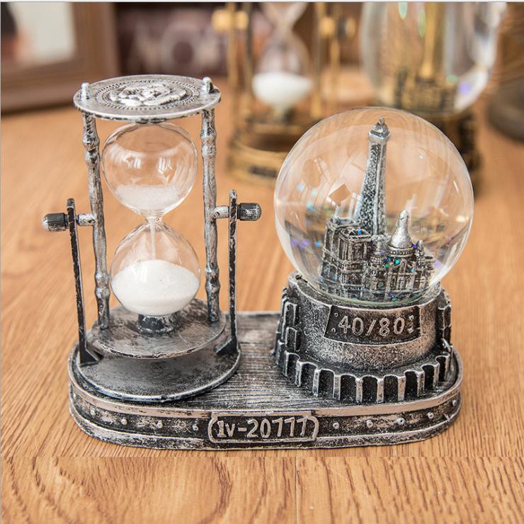 Quả cầu pha lê tuyết mô hình tháp phát sáng kèm đồng hồ cát trang trí - quà tặng độc đáo