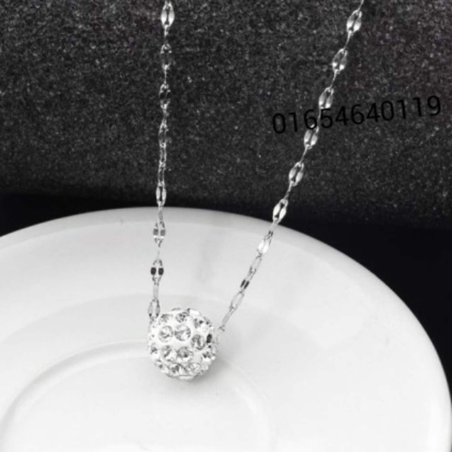 Dây chuyền nữ inox lá me trái châu xỏ ngang