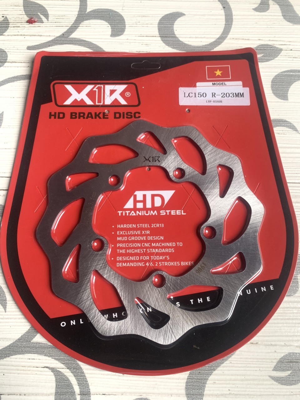 Dĩa sau xe exciter 150 hiệu x1r