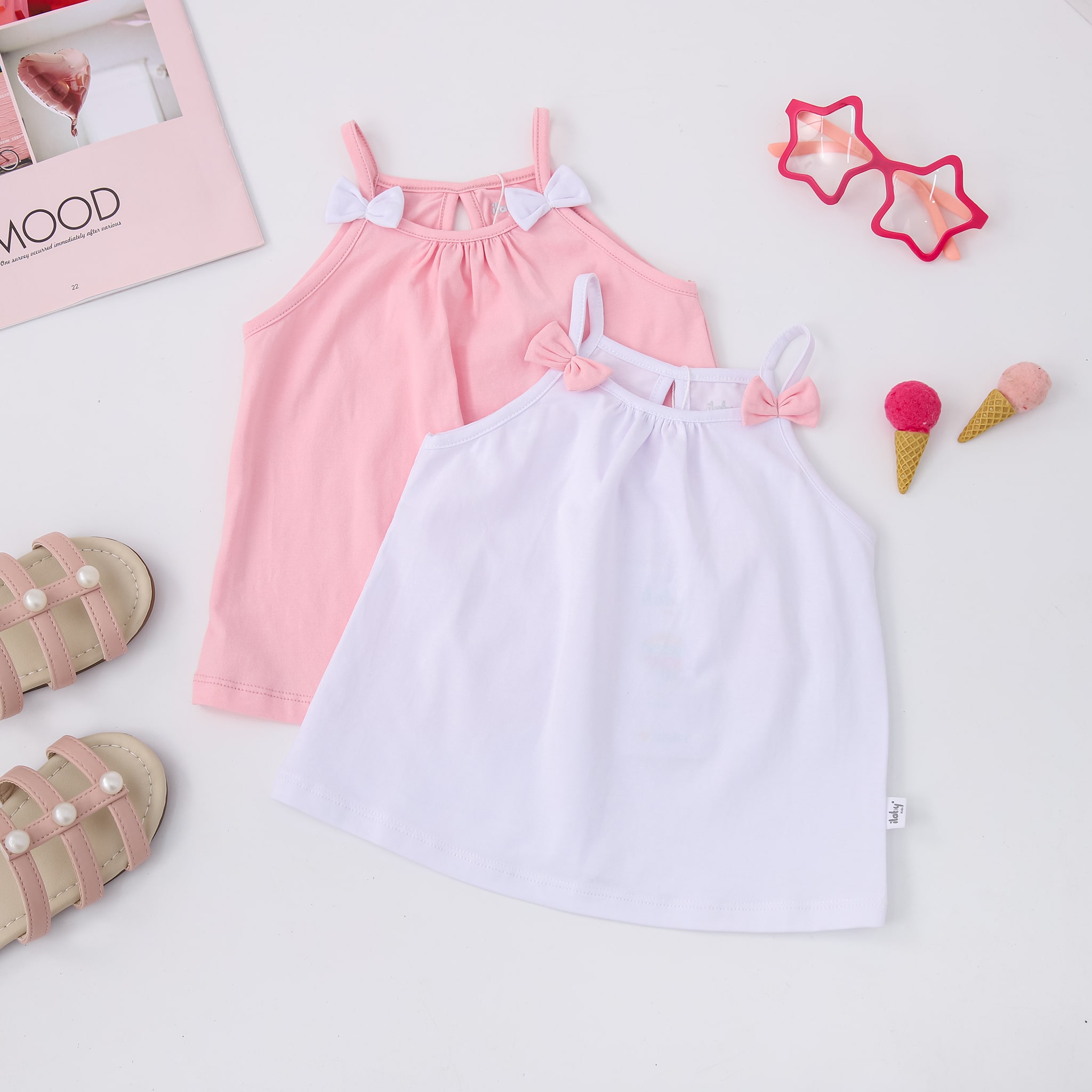 Áo thun 2 dây đính nơ vai bé gái ilaby chất liệu thun cotton co dãn 2 màu hồng trắng cho bé 2-11 tuổi [20ig1453c3dl