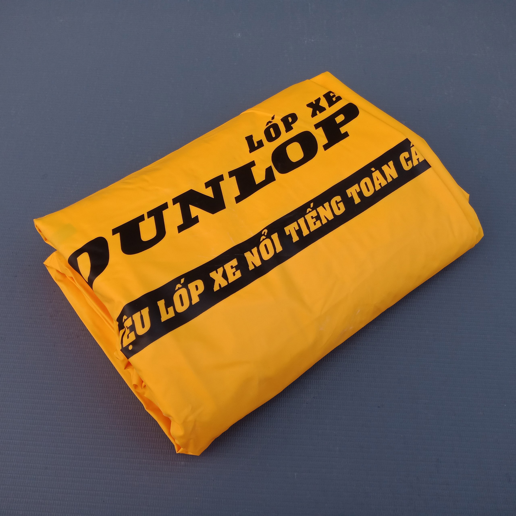 Bộ áo mưa cánh dơi Dunlop dùng cho 1 người màu vàng