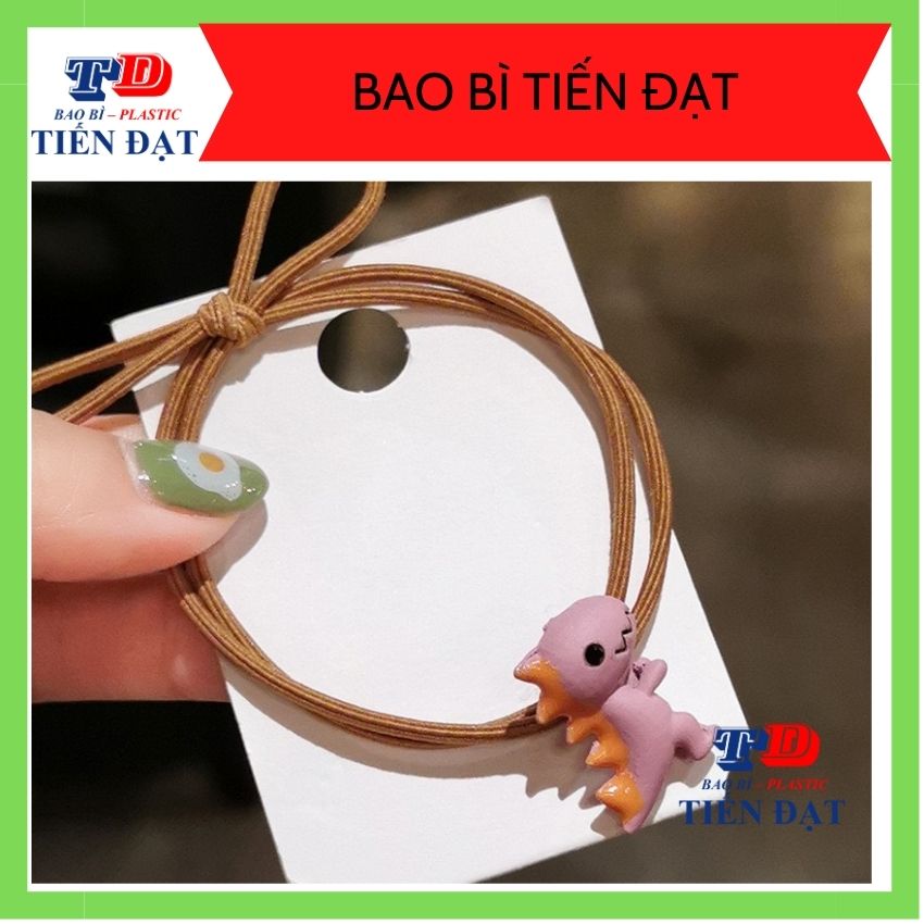 Dây cột tóc cao su co giãn hình khủng long dễ thương; thun co giãn
