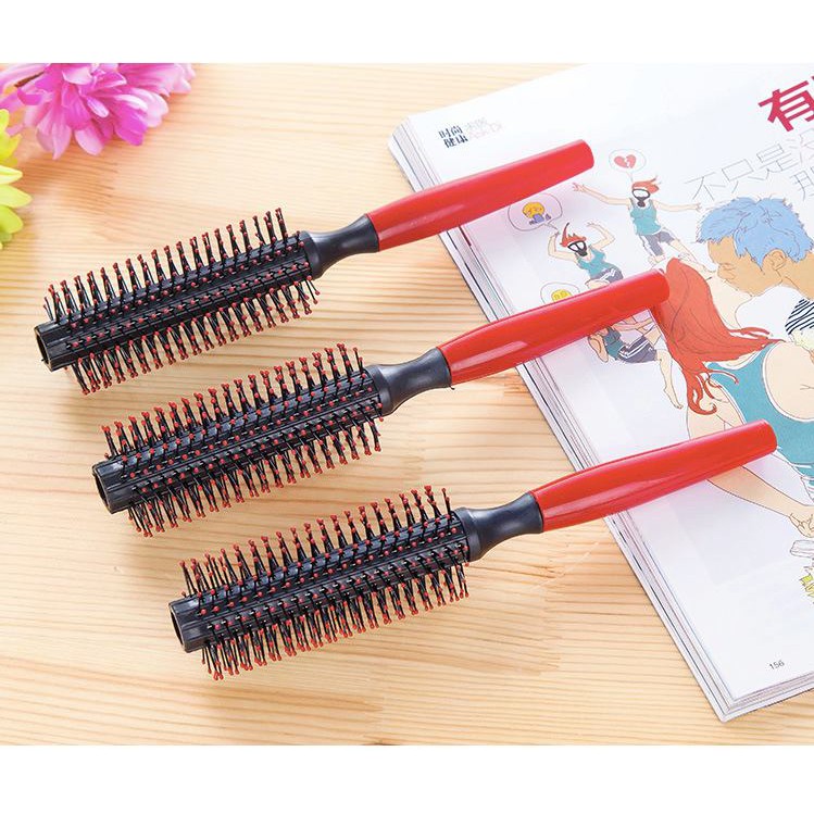 - lược tròn chải tóc uốn cán đen