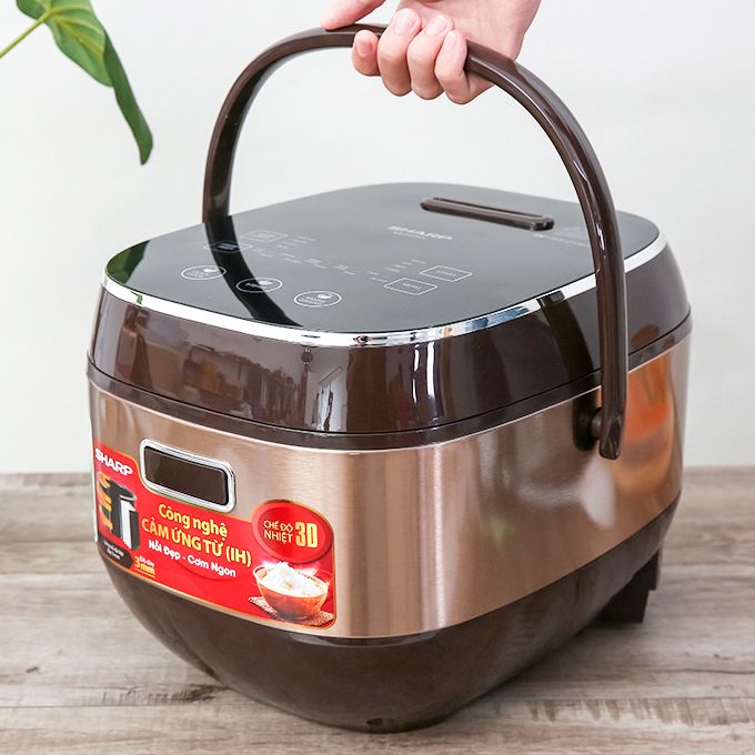 Nồi cơm điện cao tần Sharp 1.8 lít KS-IH191V-GL Mới 100%% Lòng nồi 6 lớp, dày 3 mm, làm bằng hợp kim nhôm kết hợp với thép bền bỉ, có phủ men chống dính nấu ăn tiện lợi