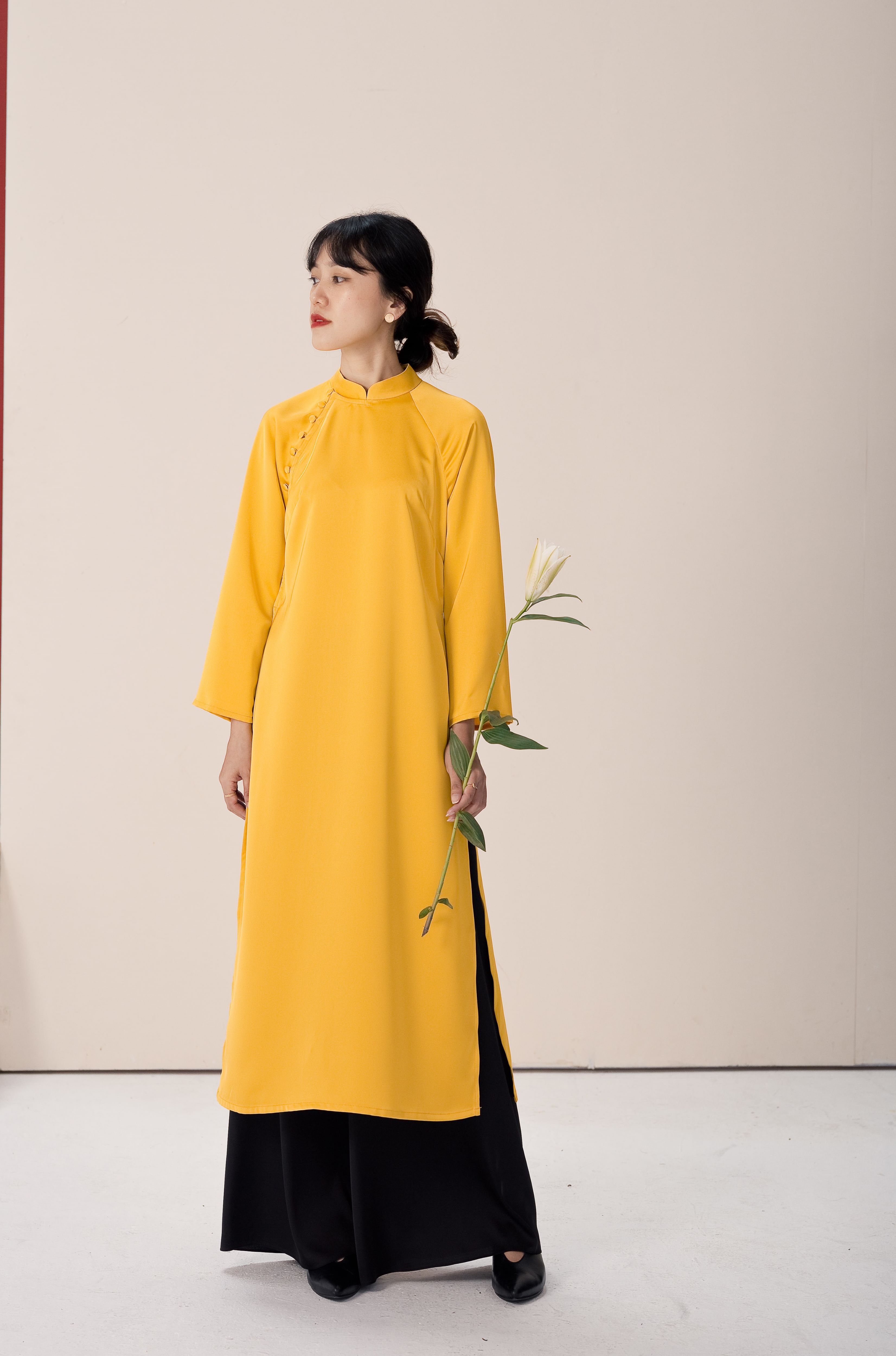 Chicka chicka - áo dài hà nội vàng