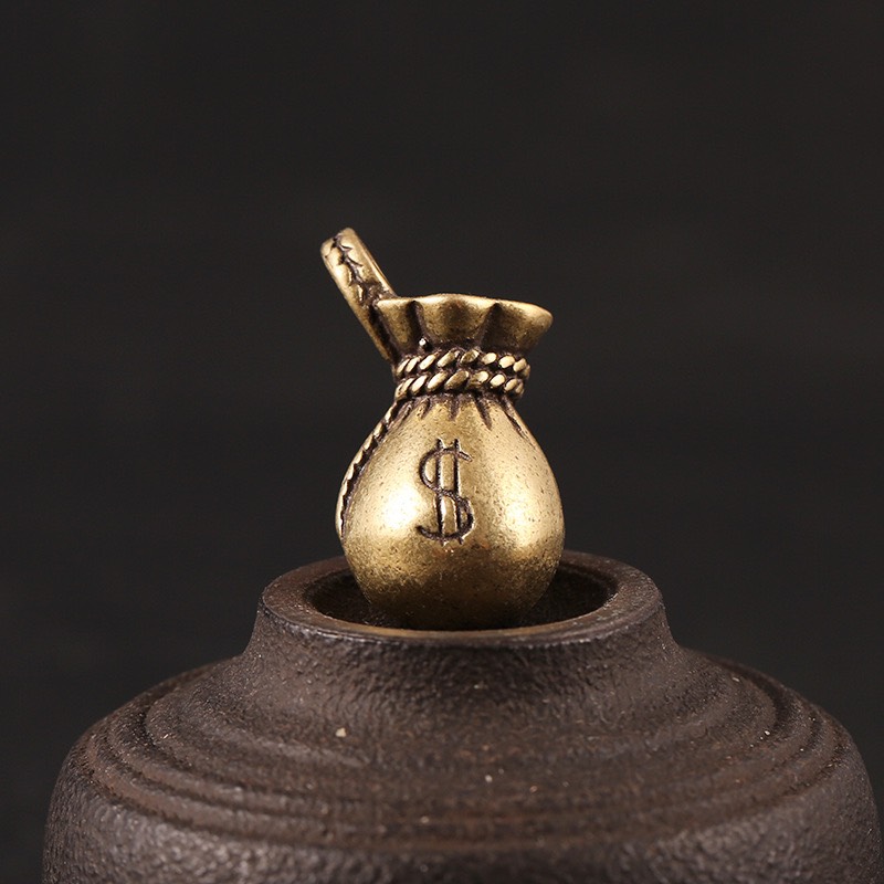 Tượng đồng thau hình túi ngân lượng - kích thước 1.7 x 3cm