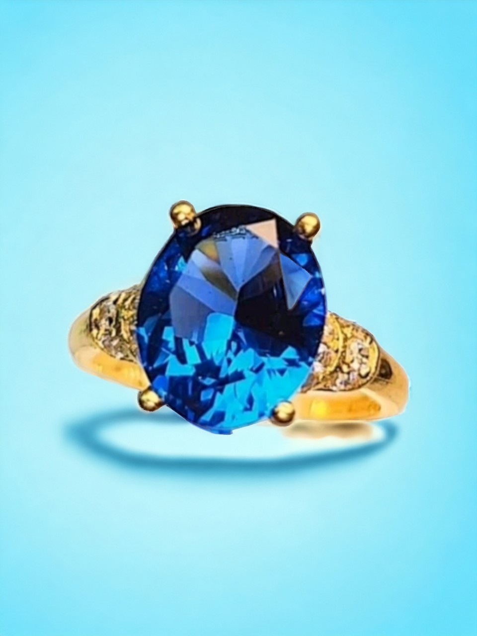 Trang sức nhẫn đeo tay thời trang, nhẫn đá oval Topaz màu xanh dương, cẩn đá tròn trắng, kiểu dáng đơn giản thanh lịch , phù hợp các bạn gái trẻ trung xinh xắn.