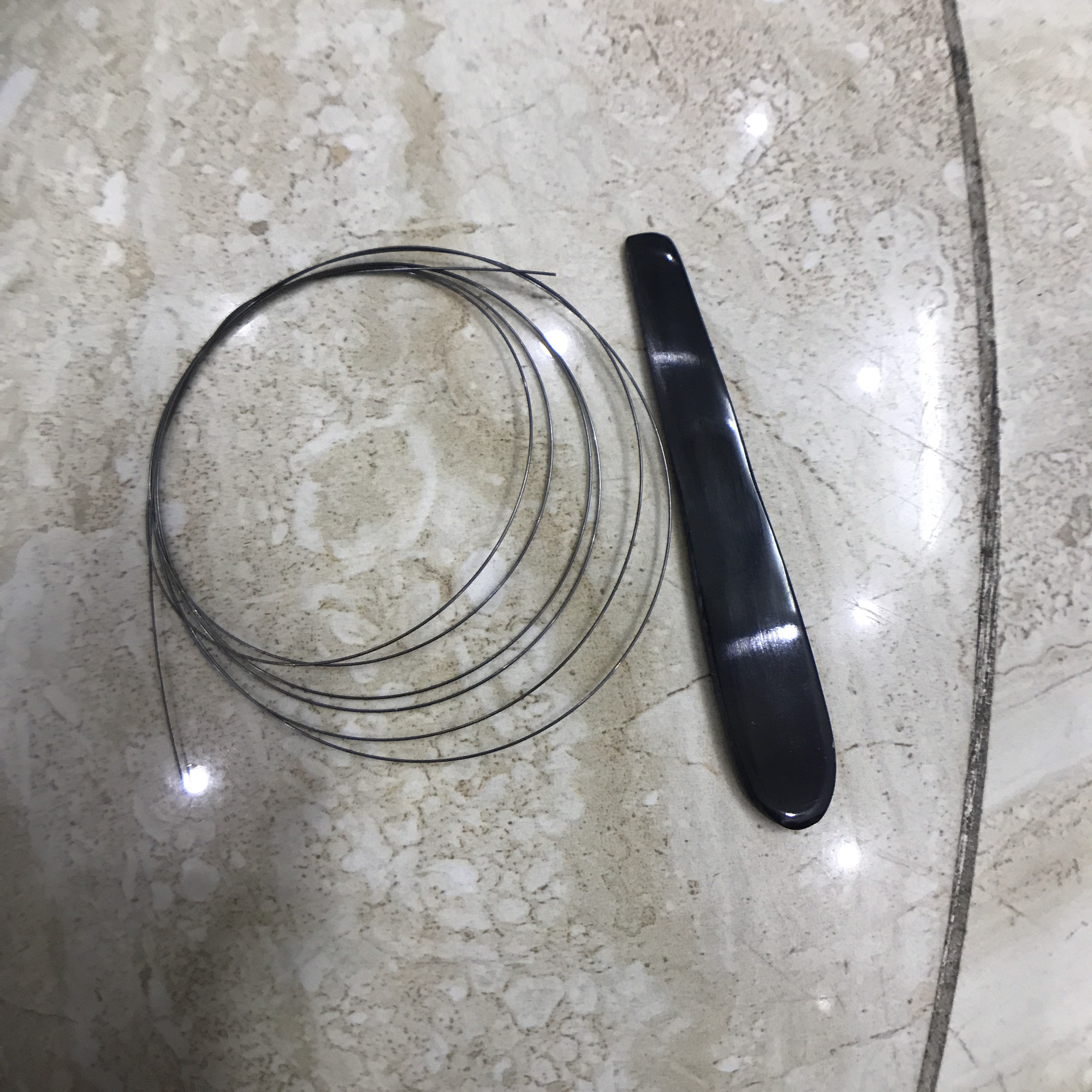 Combo que + móng gảy đàn bầu
