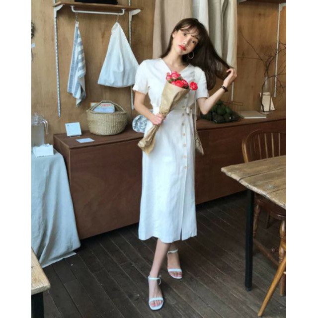 Đầm trắng nút xéo form to