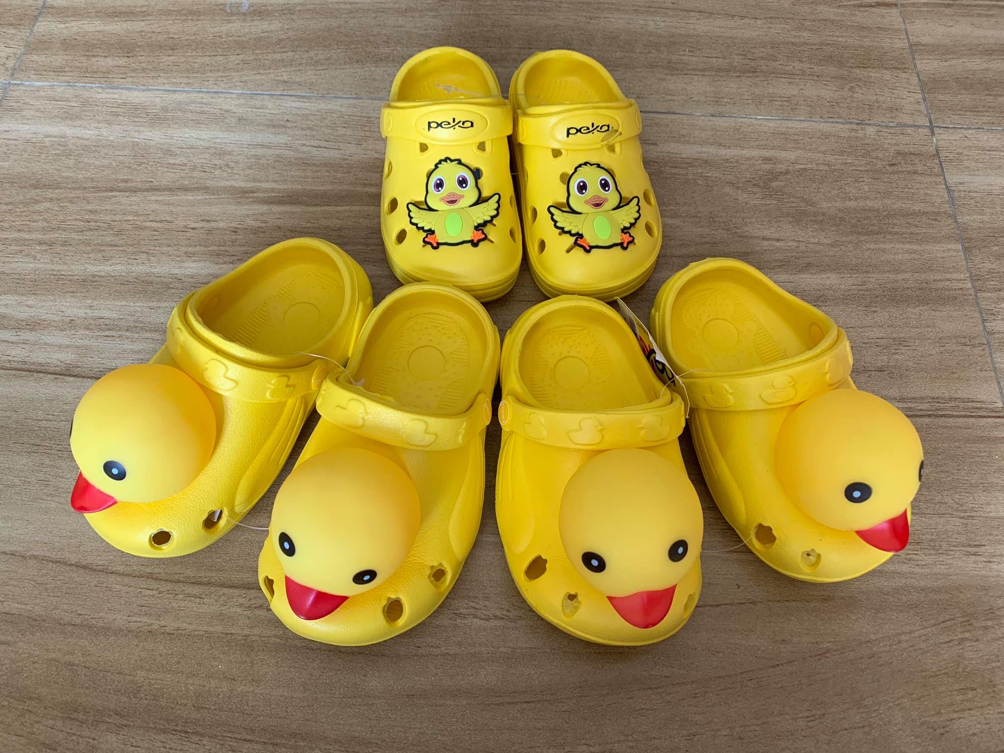 Sục vịt vàng đầu to có còi bíp bíp cho bé trai và bé gái hàng Peka Thái Lan
