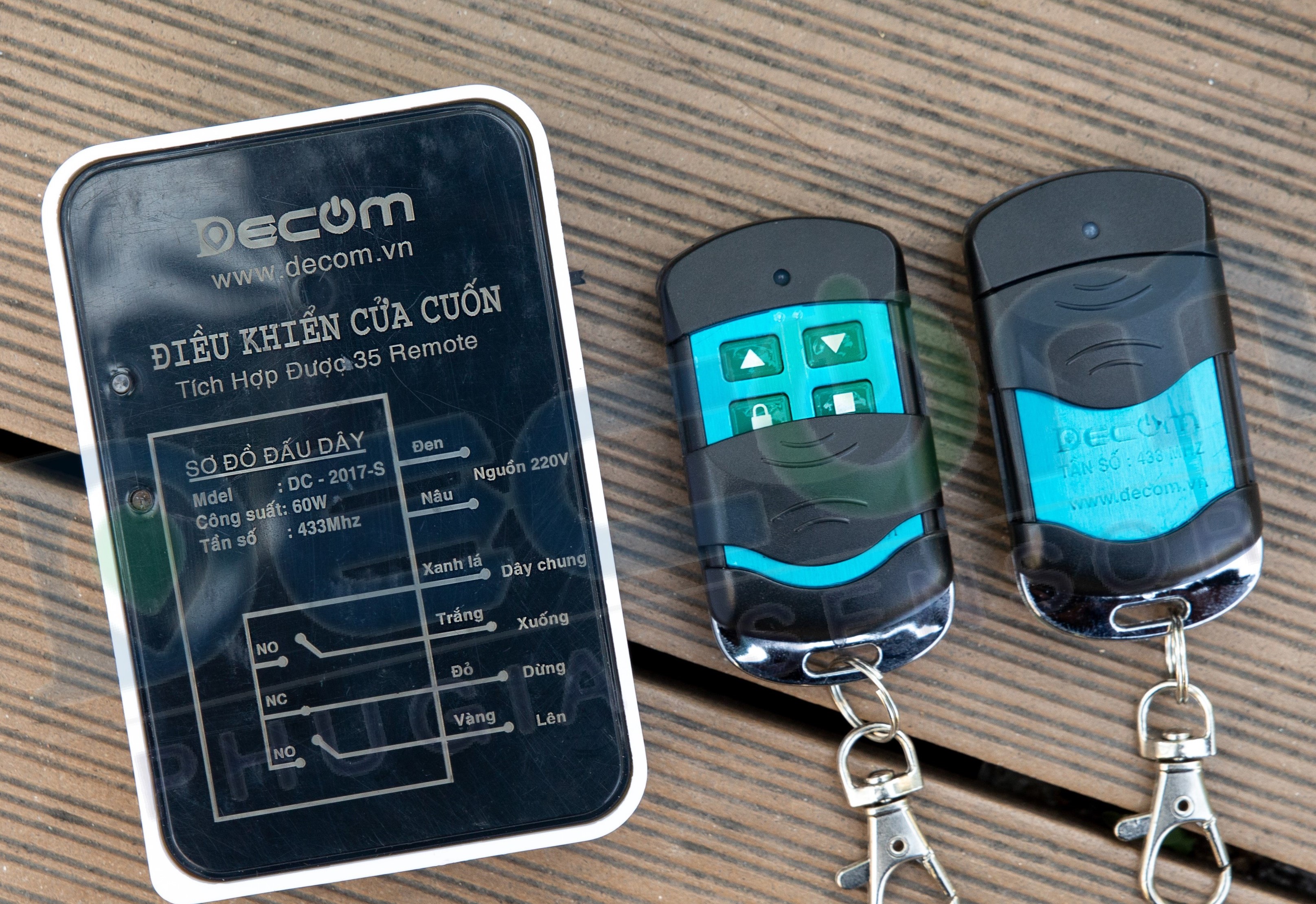 Bộ điều khiển cửa cổng cửa cuốn tự động bằng remote bền và sang trọng chính hãng Decom