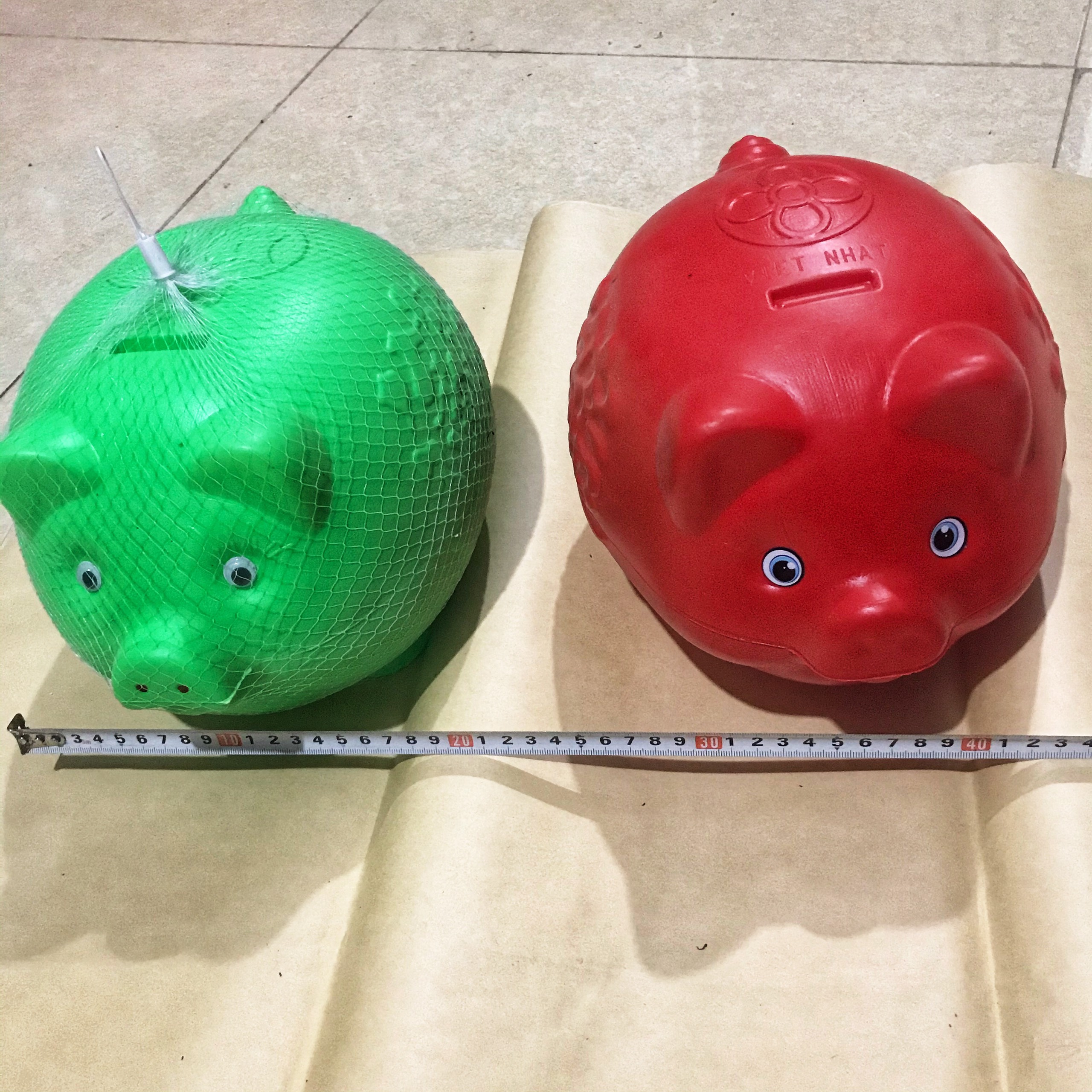 Heo (Lợn) nhựa đựng tiền tiết kiệm cỡ trung hoặc đại