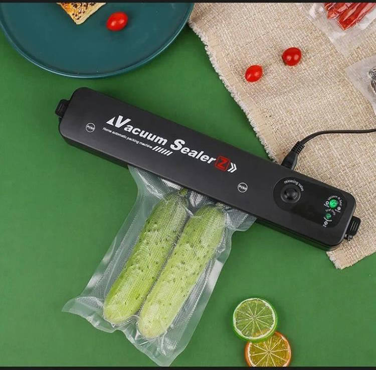 Máy ép chân không thực phẩm, Máy đóng gói hút chân không, Máy hút chân không thực phẩm Vacuum Sealer mẫu mỡi - Tặng túi hút chân không, an toàn hiệu quả, hút được 2 loại túi khác nhau. Bảo hành uy tín