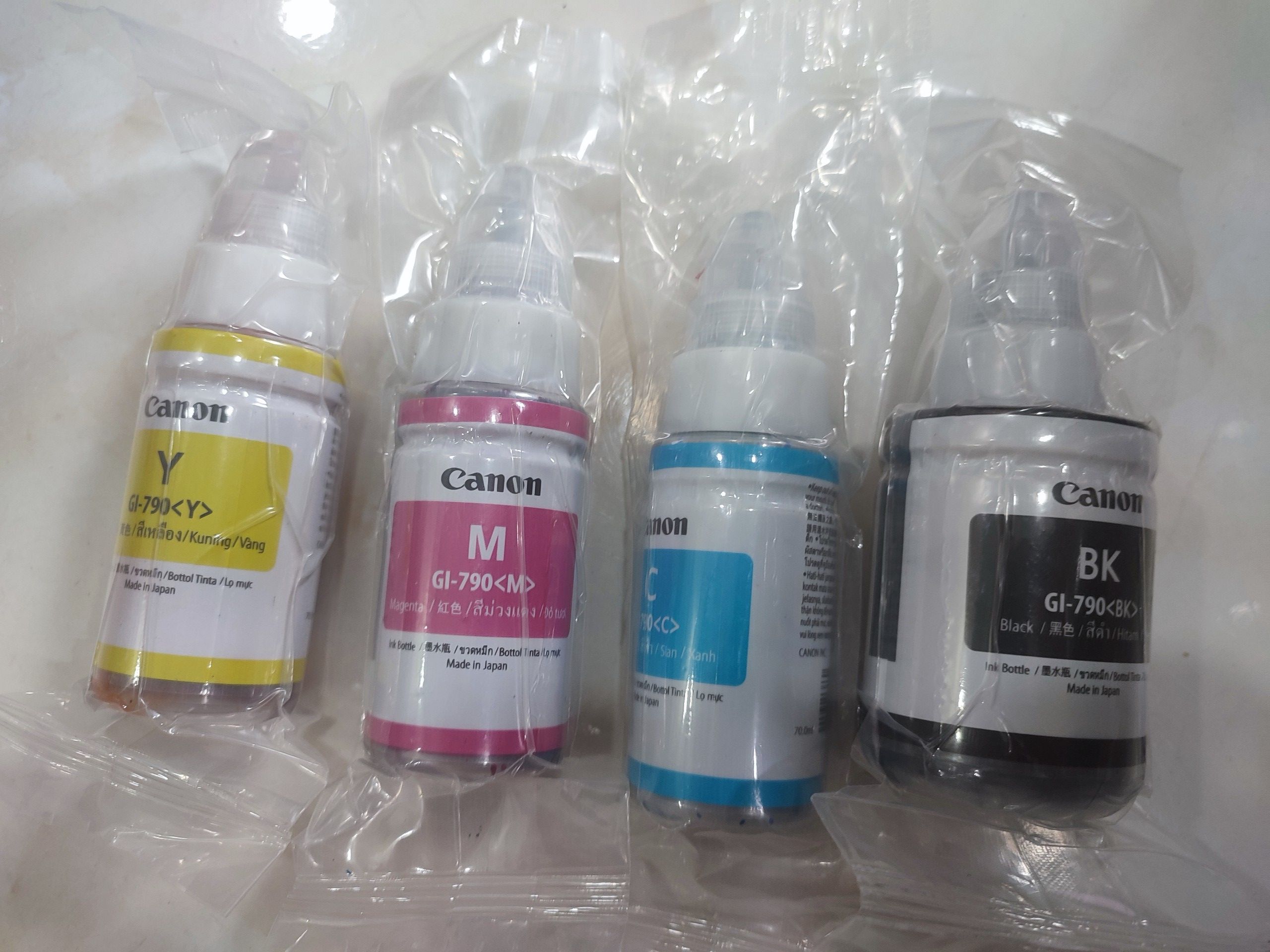 Bộ mực máy in canon g3010 xanh, đỏ, vàng, đen