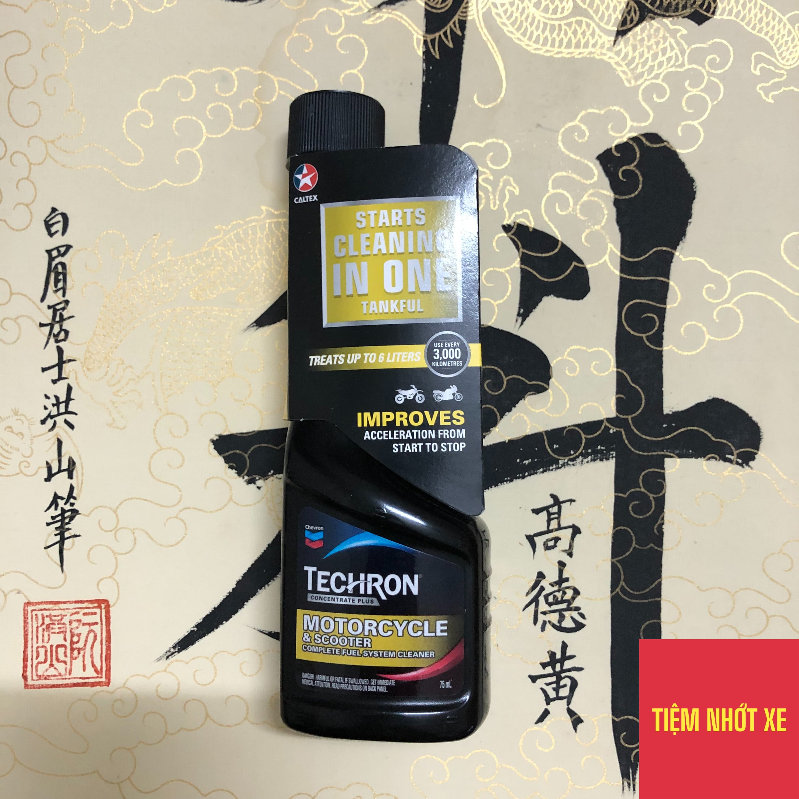 Phụ gia vệ sinh buồng đốt và kim phun xăng Caltex Havoline Techron Concentrate Plus