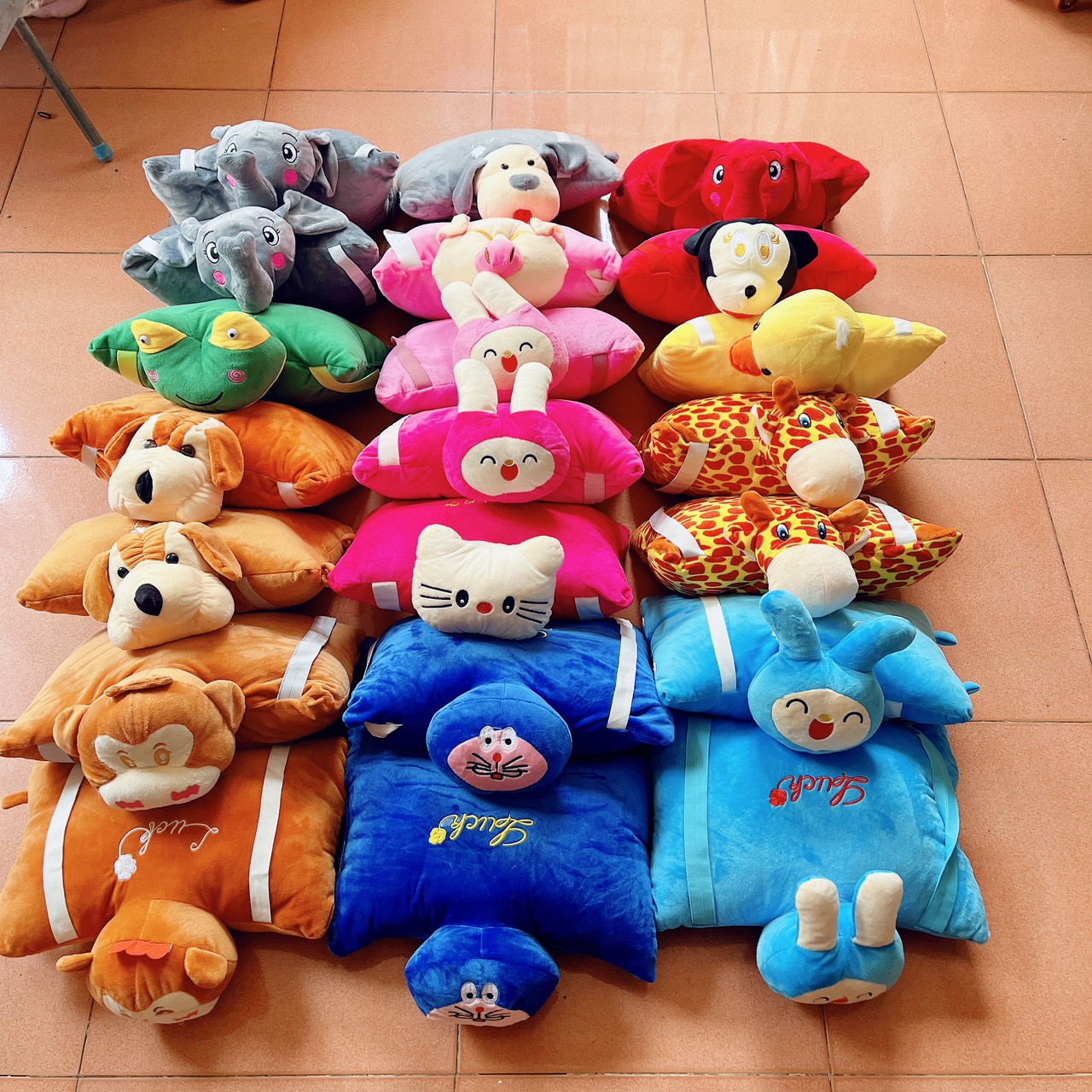 Gối đi xe máy cho bé ̣