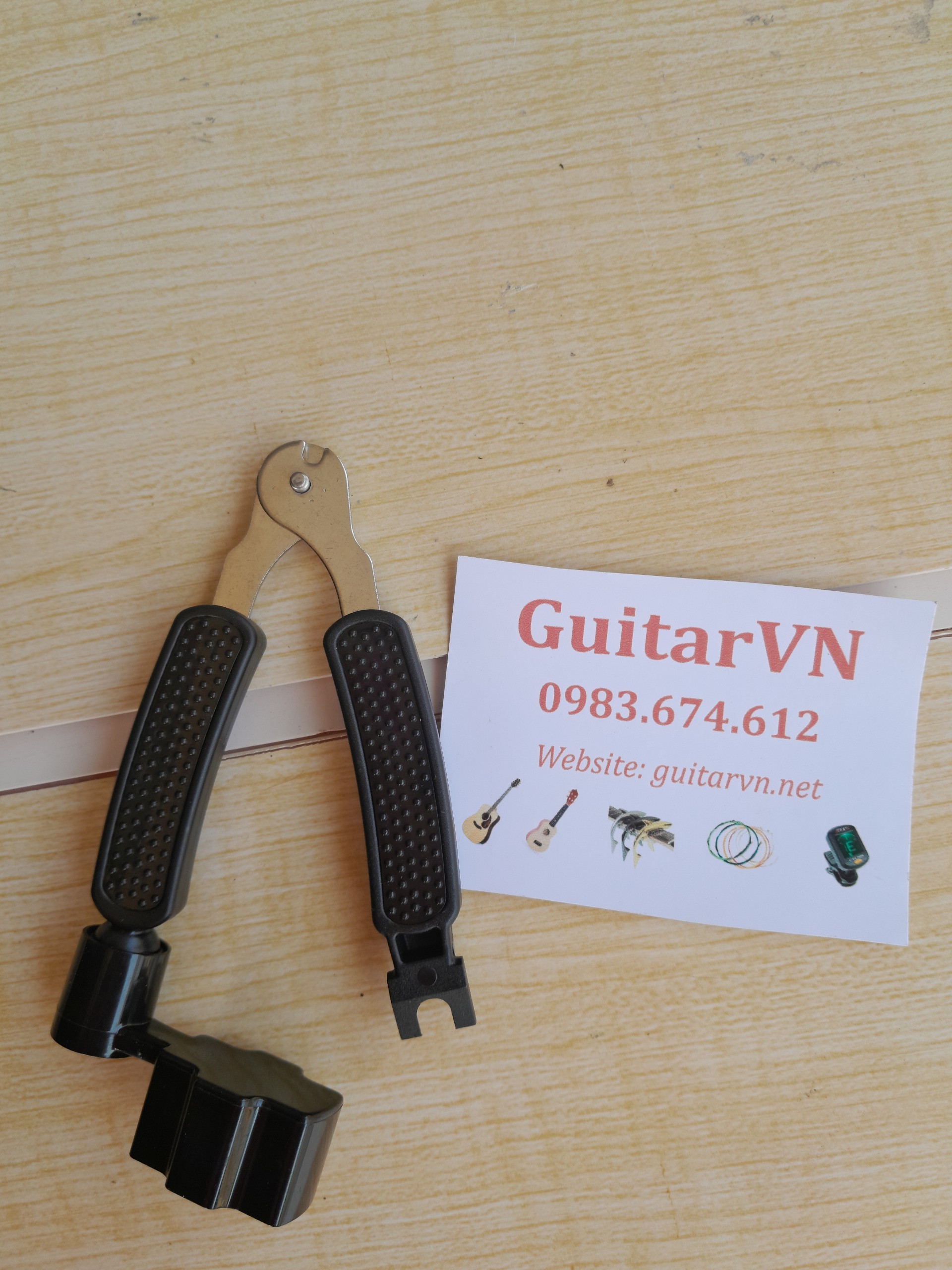 Dụng cụ thay dây đàn guitar đa năng
