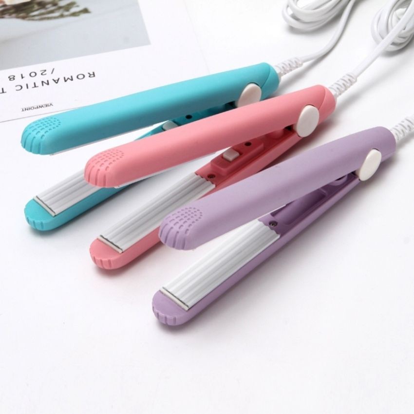 Máy bấm tóc giúp tạo nếp và không gây hư tổn dành cho nữ. Máy dập xù làm nóng nhanh và tạo nếp gấp sành điệu