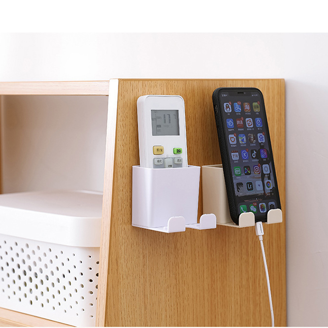 Kệ để remote sạc điện thoại dán tường tiện lợi
