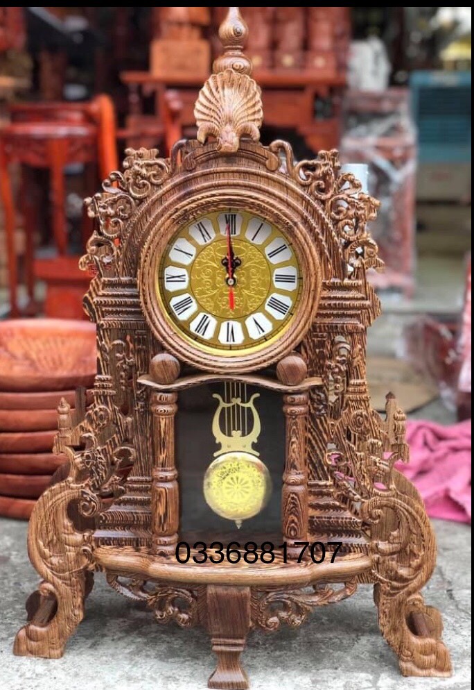 Đồng hồ gỗ mun, mẫu quả lắc gỗ mun đuôi công để bàn cao 75x48x13cm