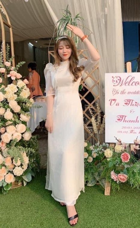 Áo dài voan tơ 4 tà màu trắng đính nơ cổ xếp ly