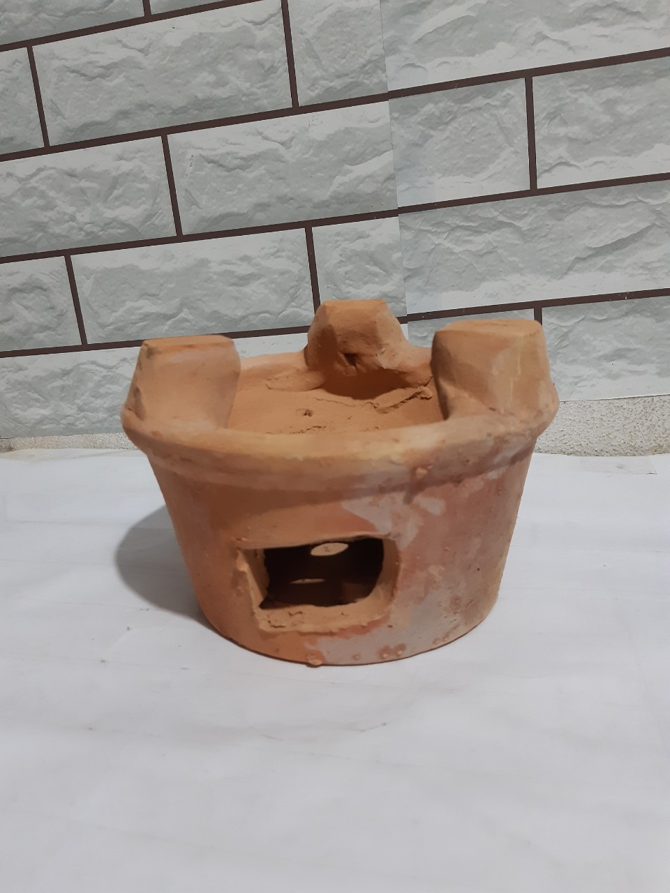 lò đất nấu than cao 13 cm , rộng từ 18 - 20 cm