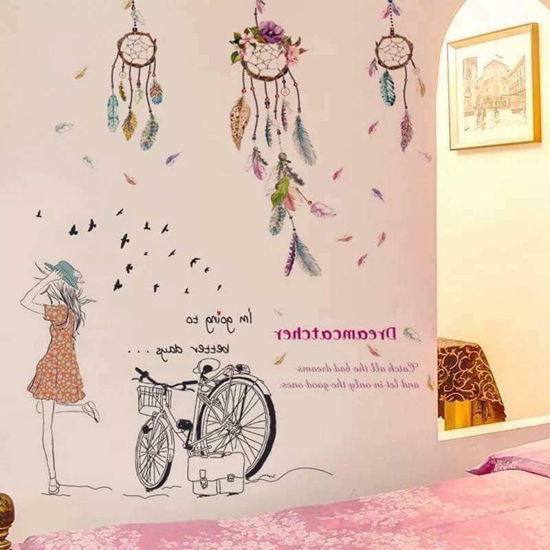 Decal dán tường chuông gió và cô gái xe đạp