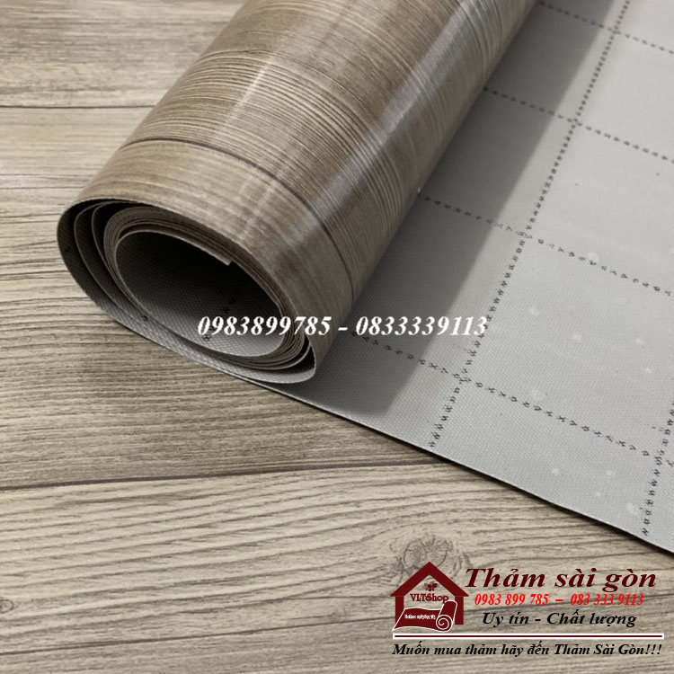 Simili trải sàn vân gỗ màu xám, mẫu mới ra xám bóng kính 1m x 1m