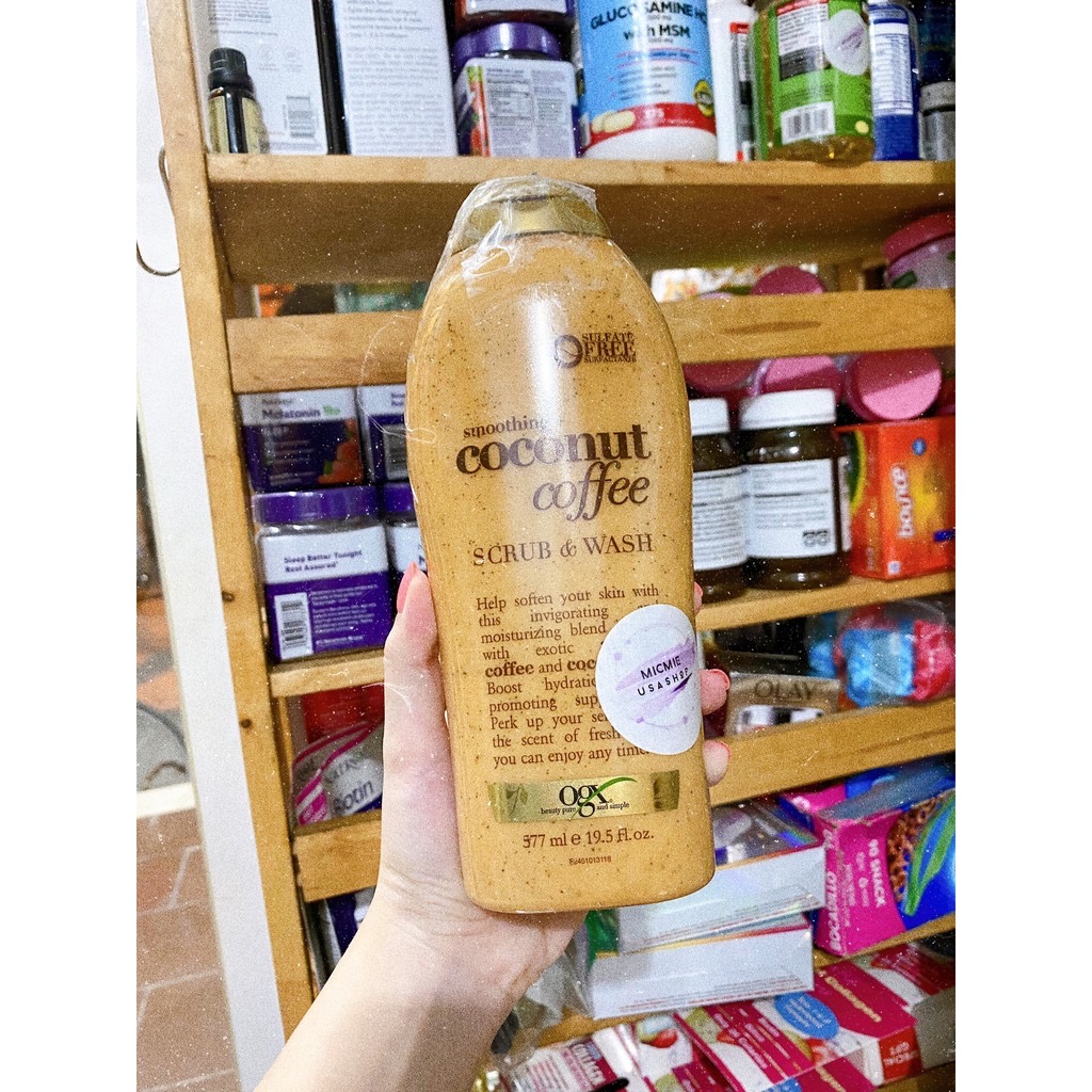 Sữa tắm ogx có hạt tẩy tế bào chết 577ml