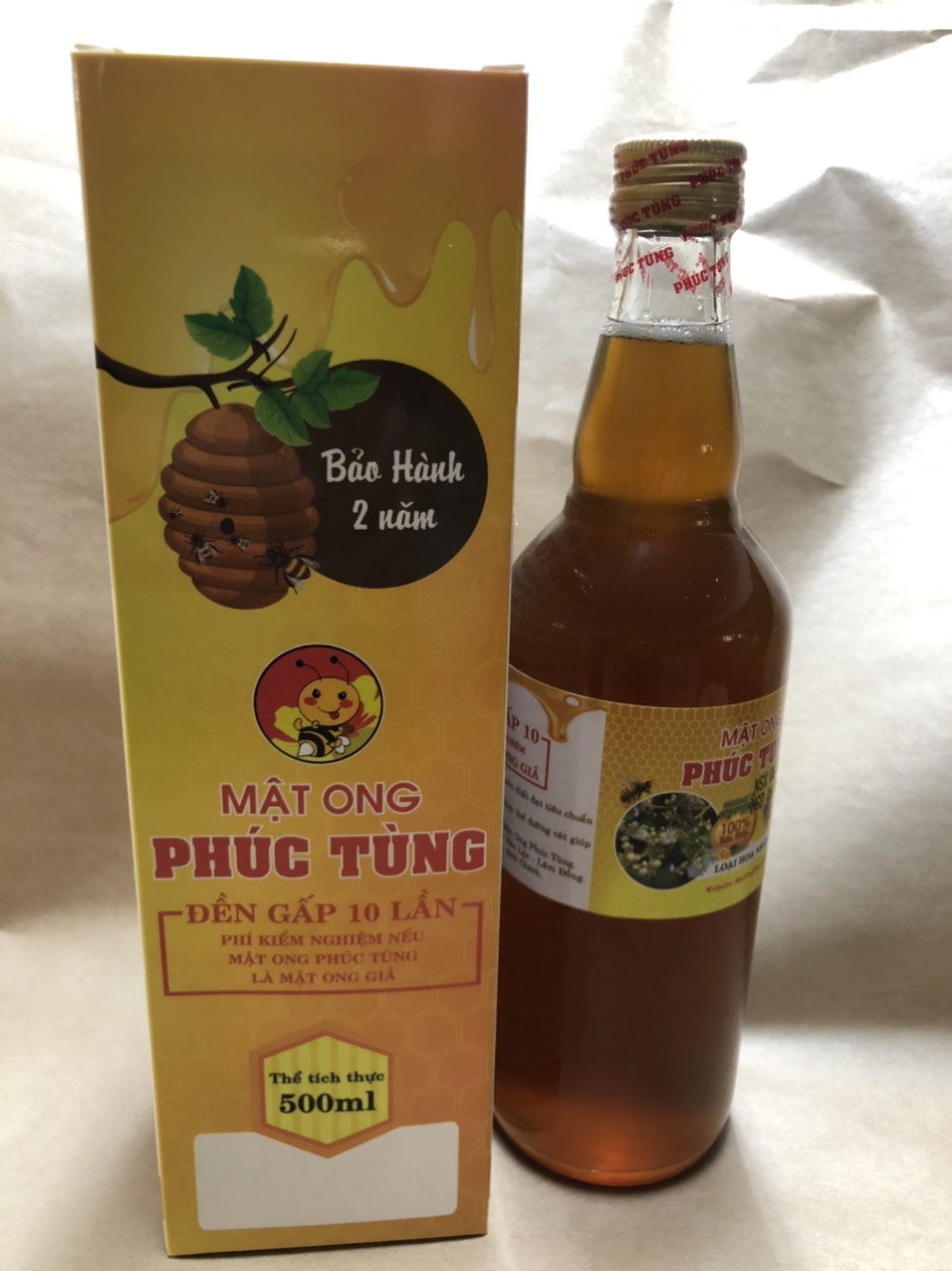 Mật ong nguyên chất hoa nhãn nam bộ phúc tùng 1 chai 500ml =675 gr