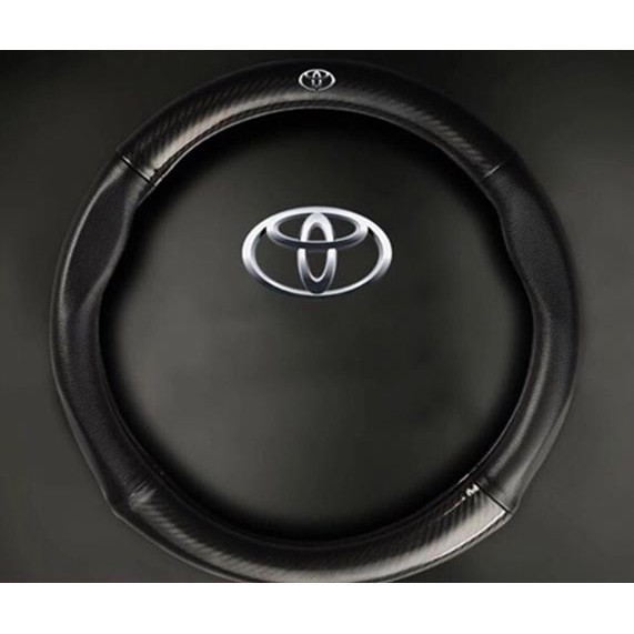 Bọc vô lăng vân carbon xe toyota