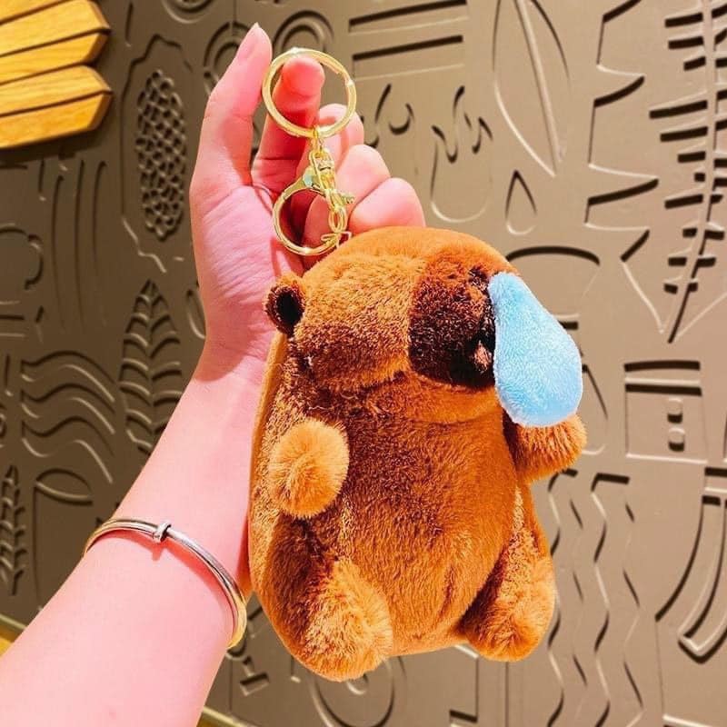 Móc khóa capybara chảy mũi rút mũi hot trend