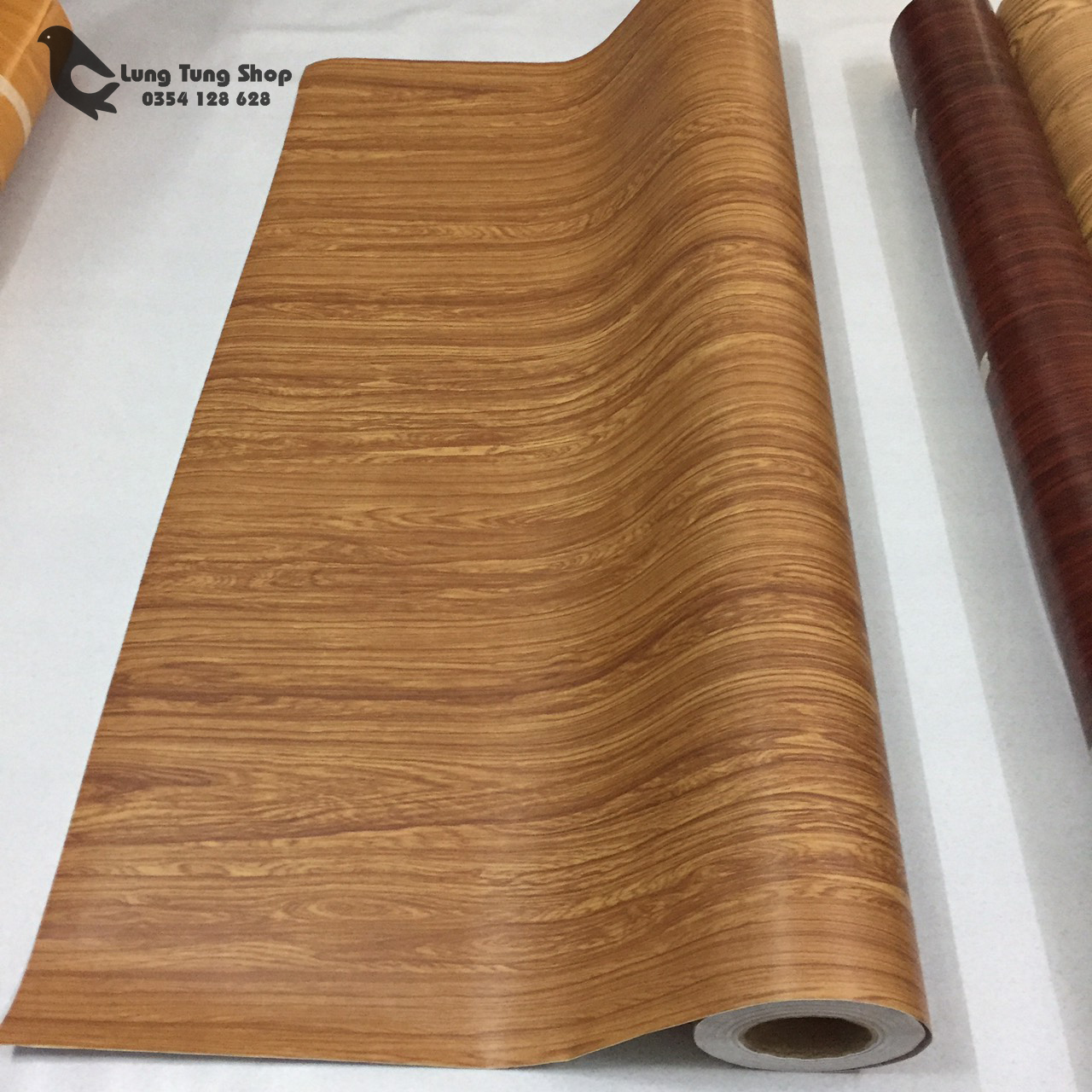[HCM]Giấy dán tường có keo - decal vân gỗ nâu ( khổ 1,2m )