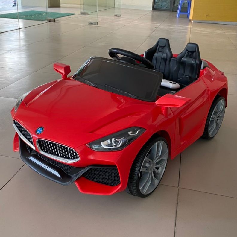 Ô tô xe điện trẻ em BMW Z4 tự lái và remote 2 động cơ bảo hành 6 tháng (Đỏ-Cam-Trắng)