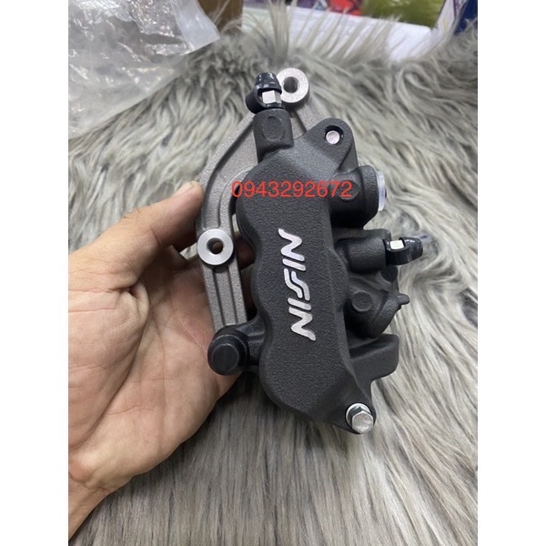 Bộ ngàm phanh trước sh 150i > 300i honda