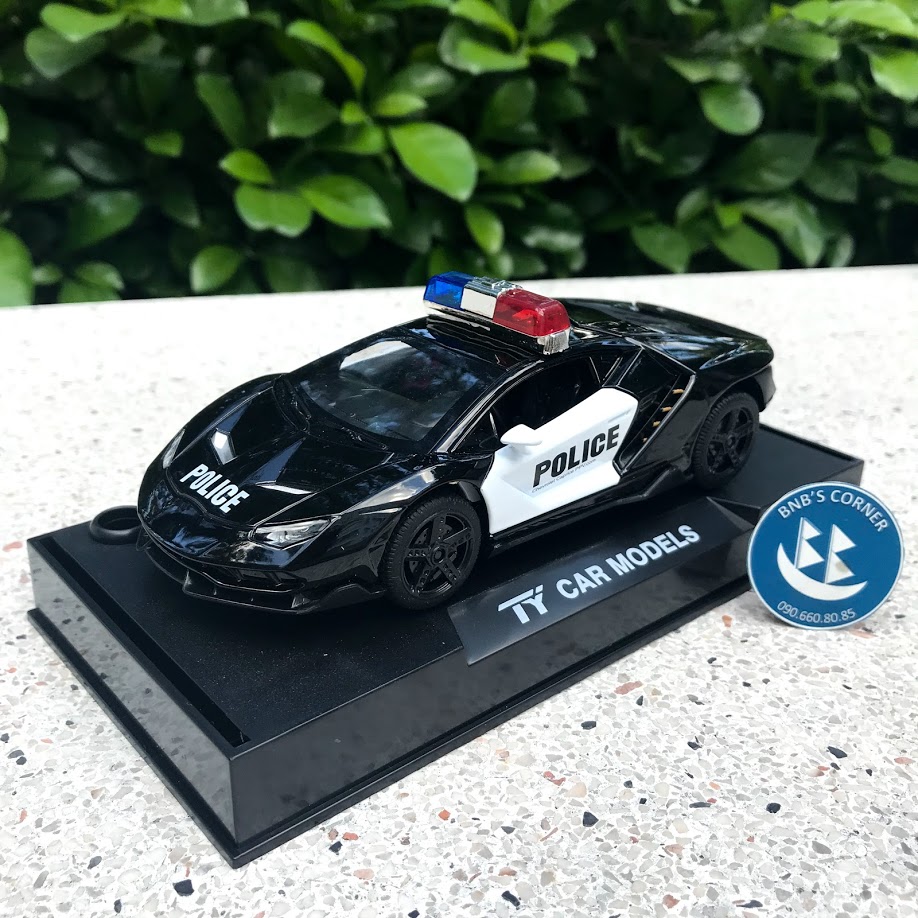 Xe đồ chơi mô hình ô tô cảnh sát bằng kim loại tỉ lệ 1:32