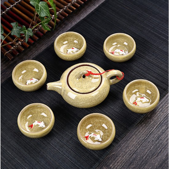 Bộ ấm trà gốm sứ cá chép cao cấp 6 chén - có chú cá nổi bên trong chén - vàng
