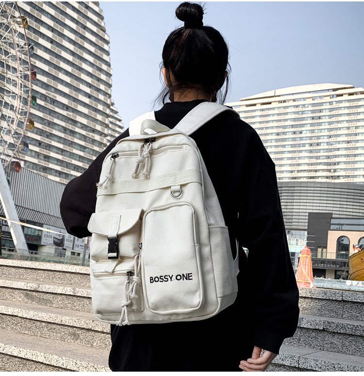 Balo đen trơn trắng đen có ngăn ngoài chất canvas siêu đẹp( ko kèm thú)