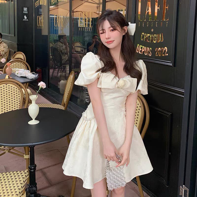 Đầm nữ dự tiệc chất gấm nơ ngực trắng Freesize eo dưới 70cm - Rossy Fashion - SR210